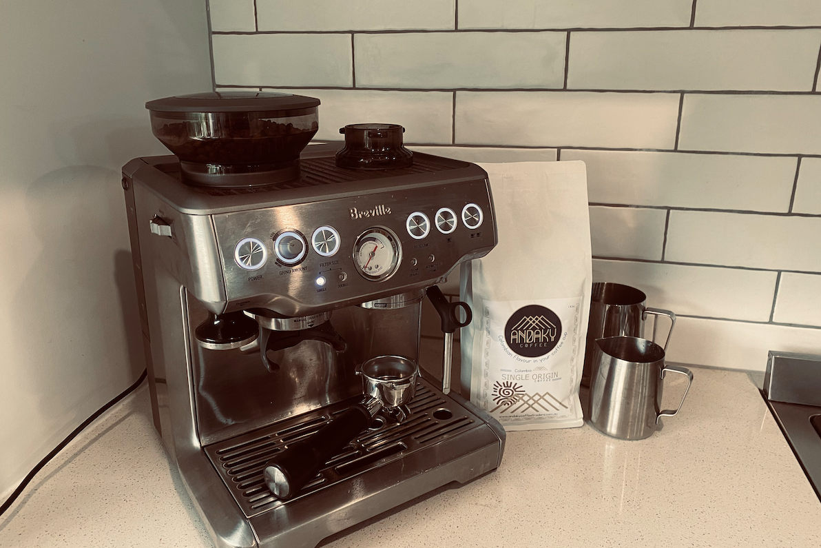 Andaky Single Origin coffee bag next to a home espresso machine, offering premium coffee subscriptions and delivery in Geelong and Melbourne.